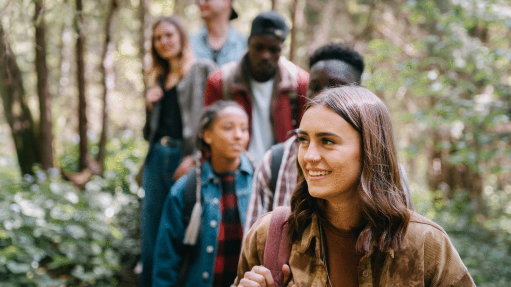 youngsters taking a trek and exploring the nature.